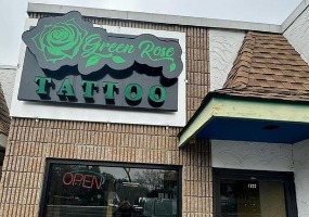 Green Rose Tattoo and Body Piercing